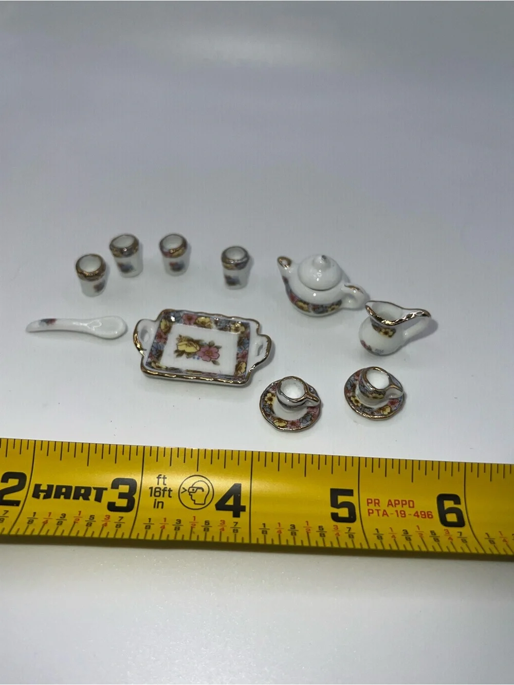 Miniature Porcelain Tea Set with Floral and Gold Trim